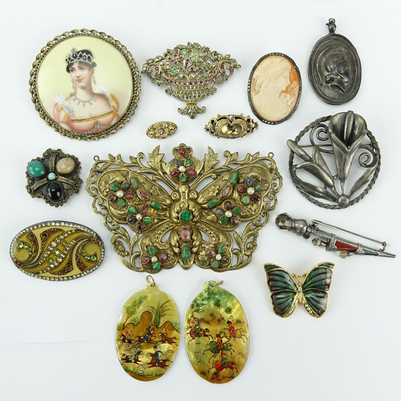 Lot of Thirteen (13) Vintage Costume Jewelry. Includes: assorted bejewelled Pins/brooches, pins, pendant, and earring.