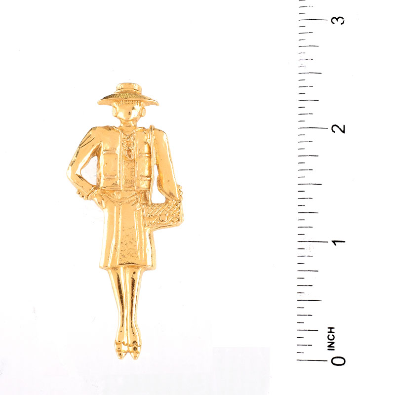 Vintage Chanel, Made in France Gold Tone Metal Figural Lady Brooch. 