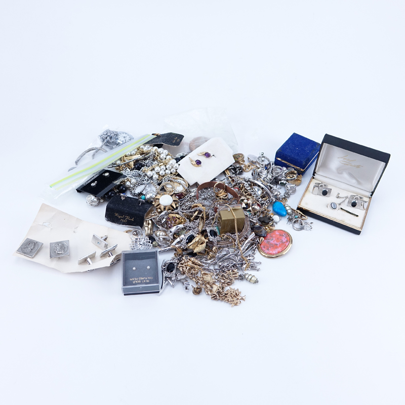 Group of Assorted Costume Jewelry along with Odds and Ends.