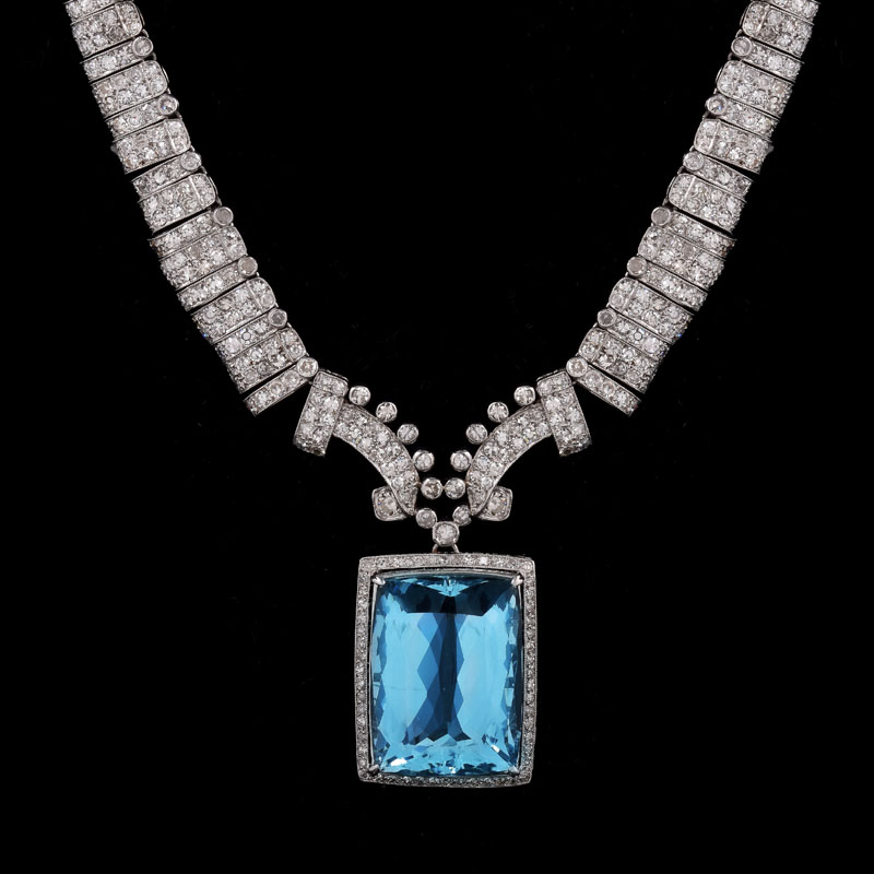 Art Deco Large Aquamarine, Diamond and Platinum Pendant Necklace. Aquamarine measures 24mm x 17mm. 