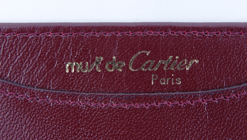 Cartier Brown Leather Card Holder. In original box. Embossed Must de Cartier.