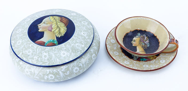 Grouping of Nine (9) Italian Majolica Ceramic Table Top Items. Includes: large charger, round covered box, covered round potpourri box, three plates, 2 cups, and small dish. 