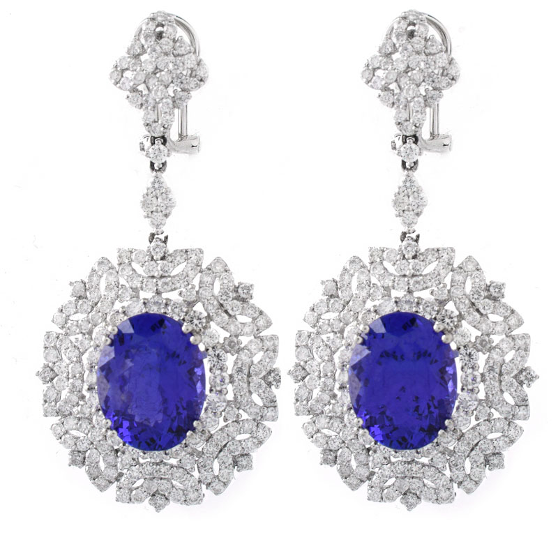 Approx. 11.65 Carat TW Oval Cut Tanzanite, 6.07 Carat Round Brilliant Cut Diamond and 18 Karat White Gold Pendant Earrings.