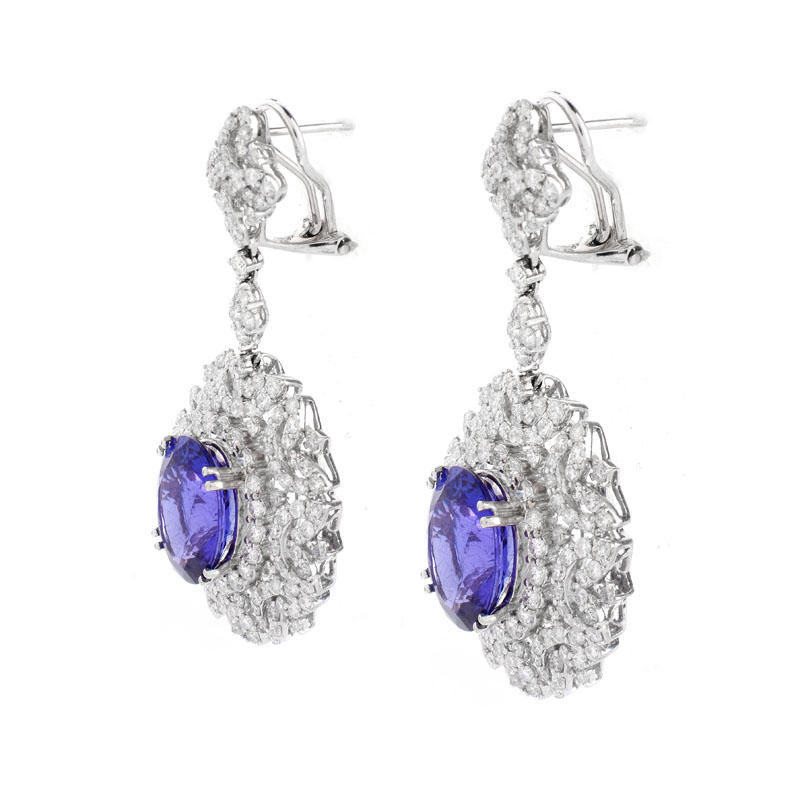 Approx. 11.65 Carat TW Oval Cut Tanzanite, 6.07 Carat Round Brilliant Cut Diamond and 18 Karat White Gold Pendant Earrings.