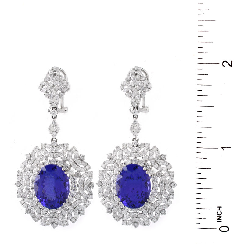 Approx. 11.65 Carat TW Oval Cut Tanzanite, 6.07 Carat Round Brilliant Cut Diamond and 18 Karat White Gold Pendant Earrings.