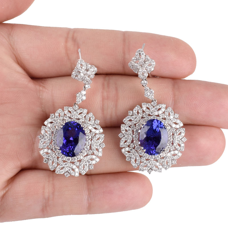 Approx. 11.65 Carat TW Oval Cut Tanzanite, 6.07 Carat Round Brilliant Cut Diamond and 18 Karat White Gold Pendant Earrings.