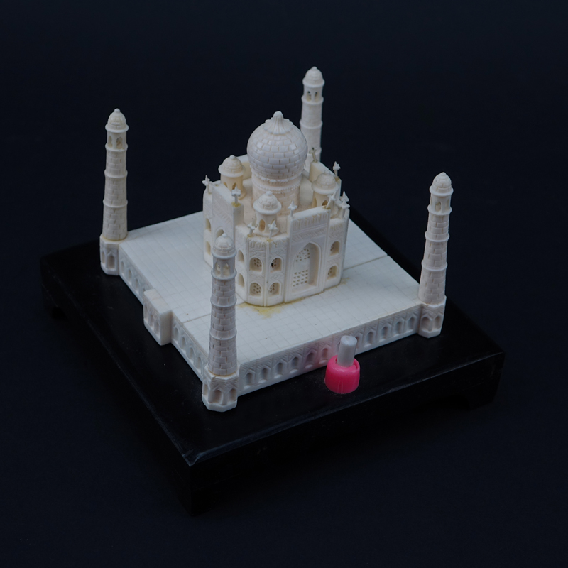 Carved Bone Model of the Taj Mahal on Wood Base. Platform is electrified.