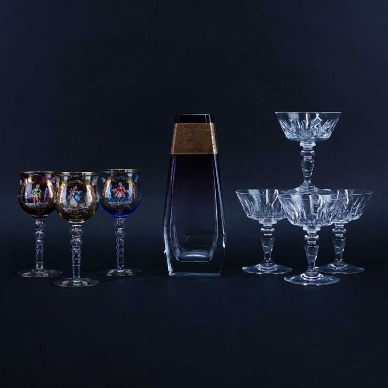 Grouping of Eight (8) Vintage Tableware. Includes: 4 Baccarat crystal champagne coupes (signed), Moser amethyst to clear Gilt painted vase (signed), and 3 figural painted colored glasses.