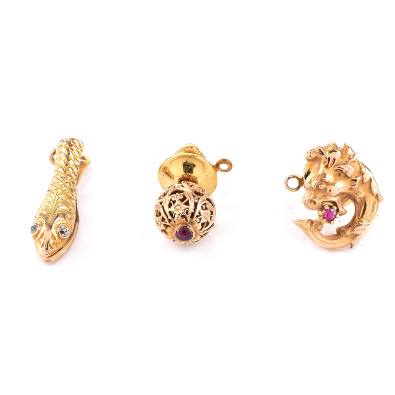 Three (3) Vintage Men's 14 Karat Yellow Gold Tie Tacks. Two with small ruby accents, one with diamond accents. 