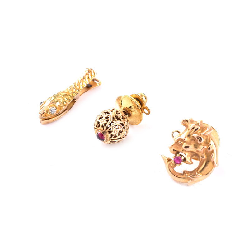 Three (3) Vintage Men's 14 Karat Yellow Gold Tie Tacks. Two with small ruby accents, one with diamond accents. 