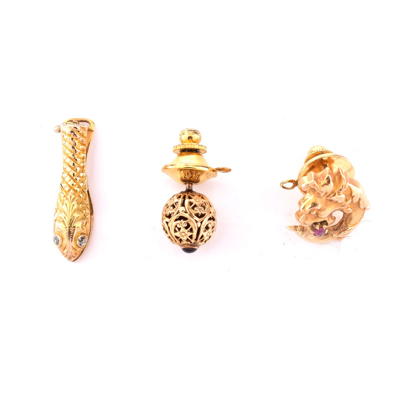 Three (3) Vintage Men's 14 Karat Yellow Gold Tie Tacks. Two with small ruby accents, one with diamond accents. 