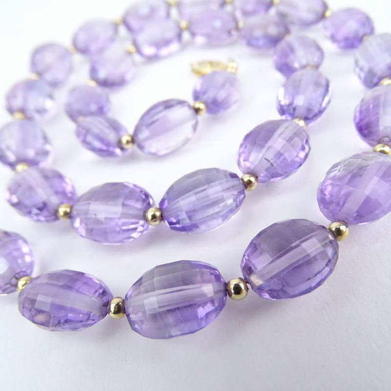 Approx. 162.0 Carat Oval Briolette Cut Graduated Amethyst Bead and 14 Karat Yellow Gold Necklace.