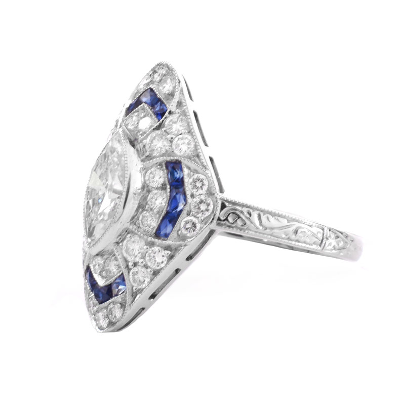 Art Deco style Approx. 1.61 Carat TW Diamond, 1.44 Carat Sapphire and Platinum Ring set in the Center with a 1.02 Carat Marquise Cut Diamond. 