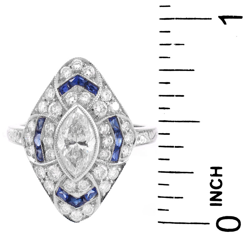 Art Deco style Approx. 1.61 Carat TW Diamond, 1.44 Carat Sapphire and Platinum Ring set in the Center with a 1.02 Carat Marquise Cut Diamond. 