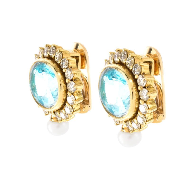 Vintage Approx. 1.70 Carat Round Brilliant Cut Diamond, Oval Cut Aquamarine, Pearl and 18 Karat Yellow Gold Clip Earrings. 