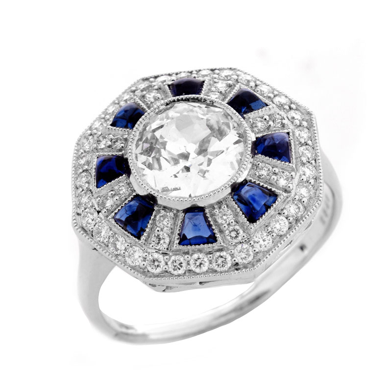 Art Deco style Approx. 1.44 Carat TW Diamond, .70 Carat Sapphire and Platinum Ring set in the Center with a 1.07 Carat Round Brilliant Cut Diamond. 