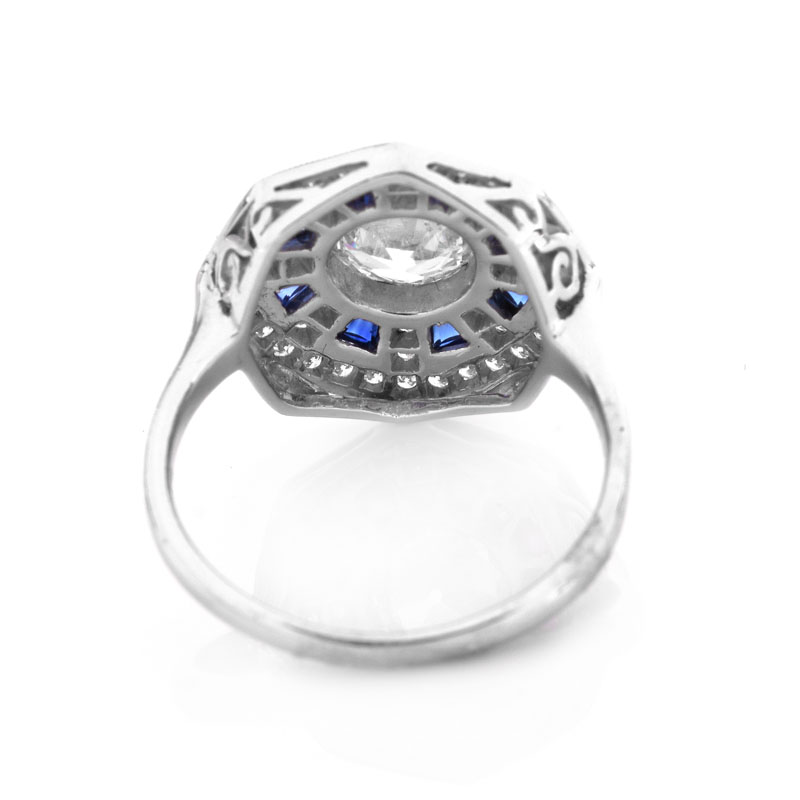 Art Deco style Approx. 1.44 Carat TW Diamond, .70 Carat Sapphire and Platinum Ring set in the Center with a 1.07 Carat Round Brilliant Cut Diamond. 