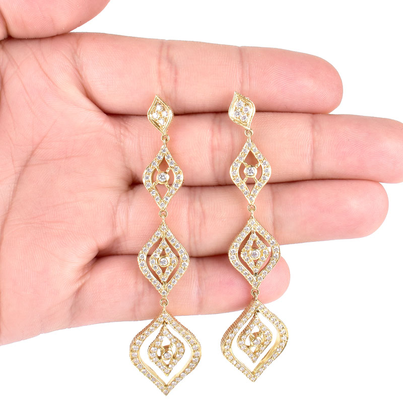 Vintage Doris Panos Approx. 2.32 Carat Pave Set Round Brilliant Cut Diamond and 18 Karat Yellow Gold Pendant Earrings.