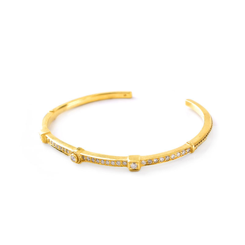 Vintage Doris Panos Approx. .84 Carat Diamond and 18 Karat Yellow Gold Cuff Bangle Bracelet.