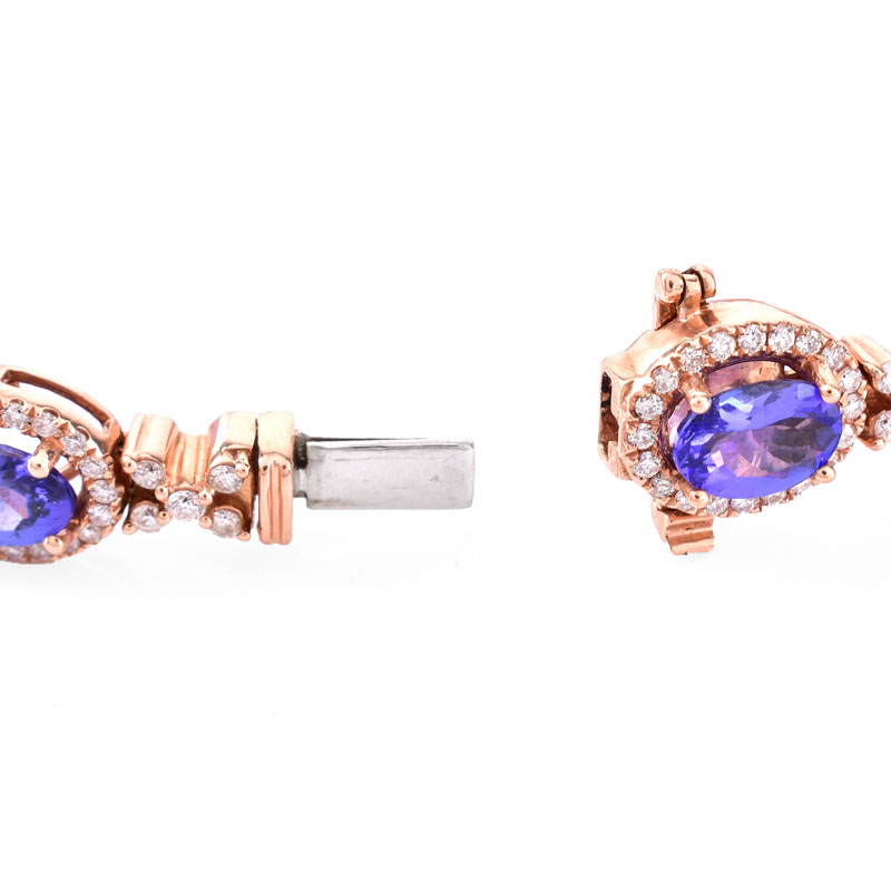 Approx. 13.75 Carat Oval Cut Tanzanite, 4.15 Carat Round Brilliant Cut Diamond and 14 Karat Rose Gold Bracelet. Tanzanites with vivid color. 