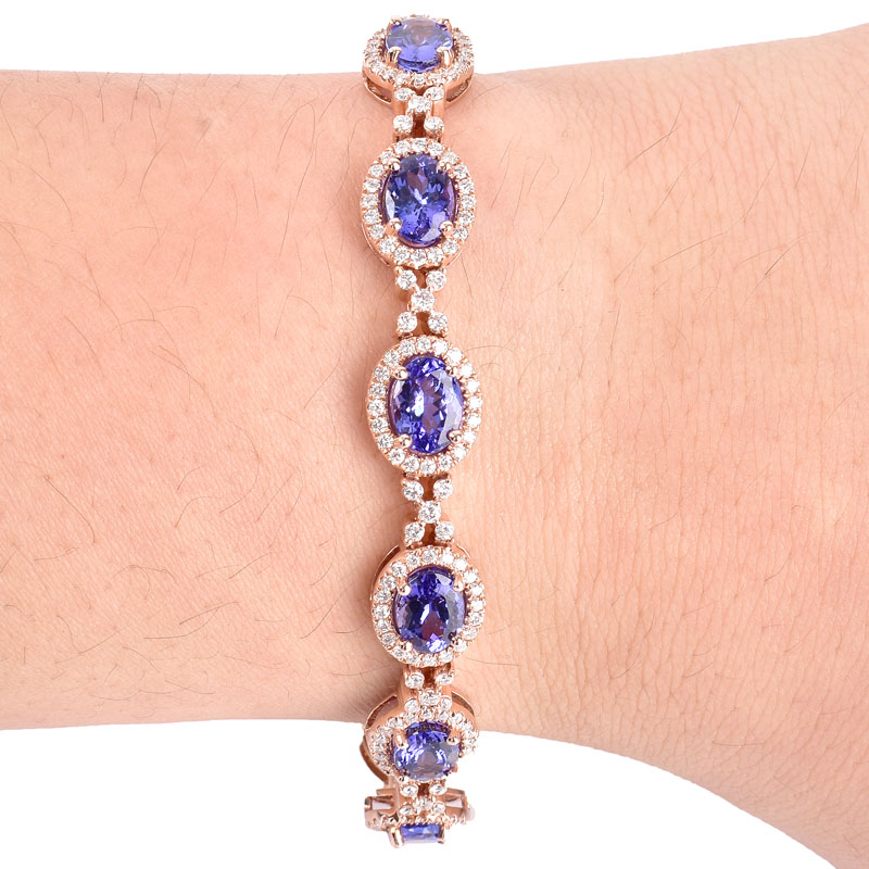 Approx. 13.75 Carat Oval Cut Tanzanite, 4.15 Carat Round Brilliant Cut Diamond and 14 Karat Rose Gold Bracelet. Tanzanites with vivid color. 