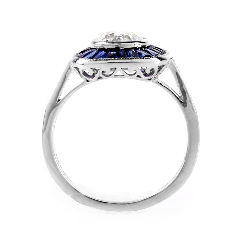 Art Deco style Approx. 1.14 Carat TW Diamond, .87 Carat Sapphire and Platinum Ring set in the Center with a .91 Carat Round Brilliant Cut Diamond. 