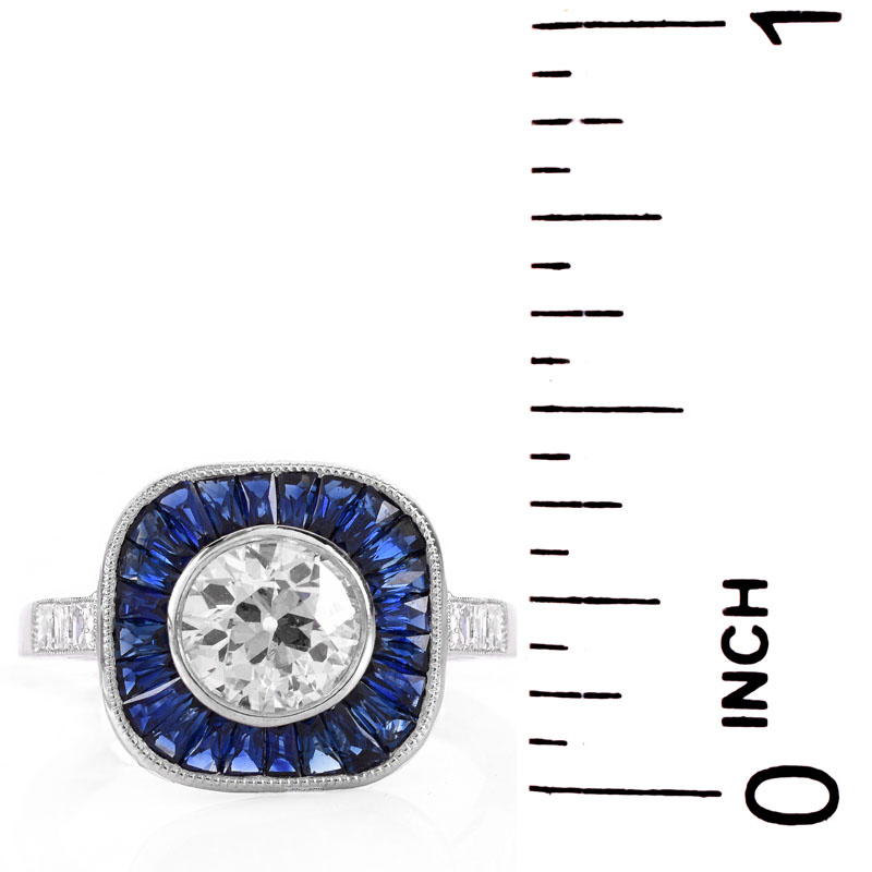 Art Deco style Approx. 1.14 Carat TW Diamond, .87 Carat Sapphire and Platinum Ring set in the Center with a .91 Carat Round Brilliant Cut Diamond. 