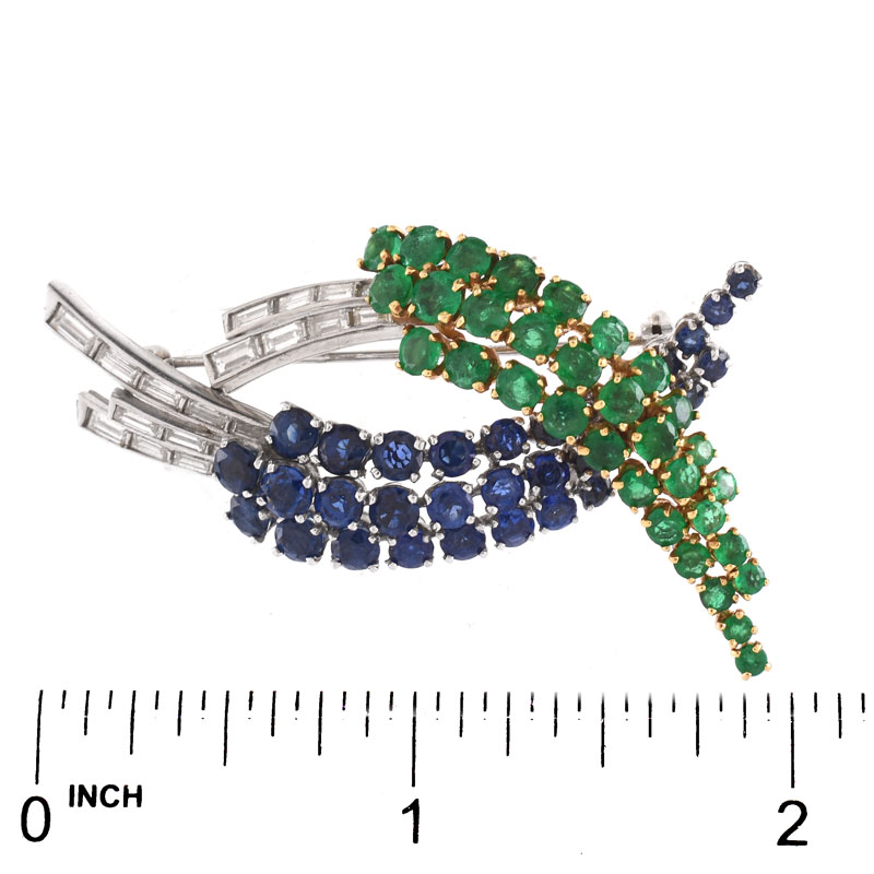 Vintage Round Cut Emerald and Sapphire, Baguette Cut Diamond, Platinum and 18 Karat Yellow Gold Brooch. 