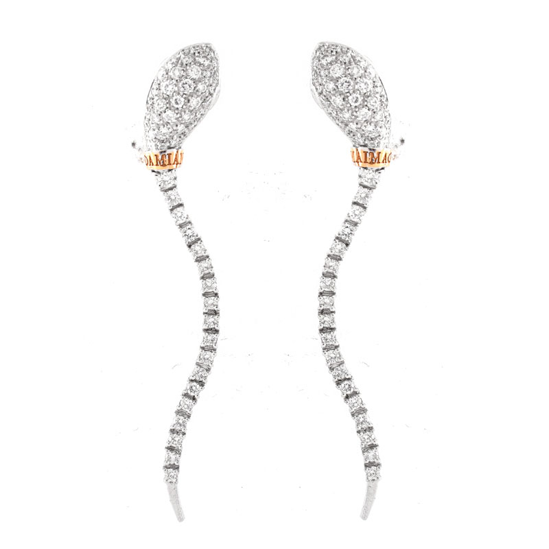 Vintage Italian Damiani Approx. 2.0 Carat Pave Set Diamond and 18 karat White Gold Articulated Snake Earrings.