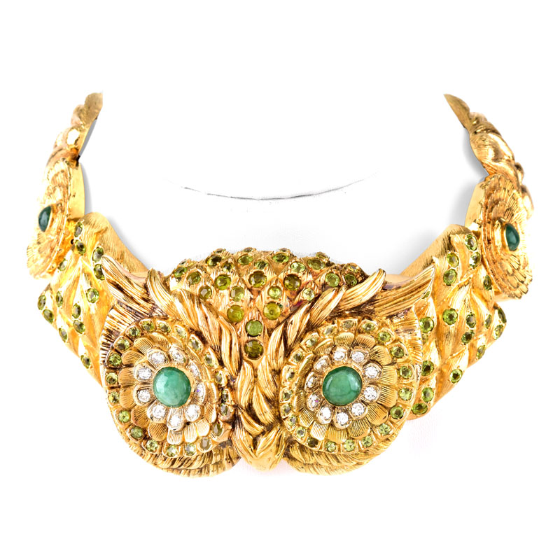 Circa 1970 Austrian Round Brilliant Cut Diamond, Cabochon Emerald, Peridot and Heavy 18 Karat Yellow Gold Large Collar Owl Necklace. 