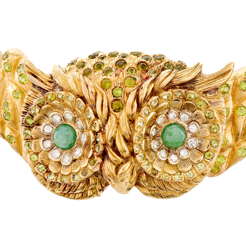 Circa 1970 Austrian Round Brilliant Cut Diamond, Cabochon Emerald, Peridot and Heavy 18 Karat Yellow Gold Large Collar Owl Necklace. 