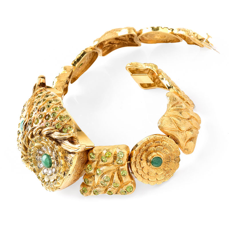 Circa 1970 Austrian Round Brilliant Cut Diamond, Cabochon Emerald, Peridot and Heavy 18 Karat Yellow Gold Large Collar Owl Necklace. 