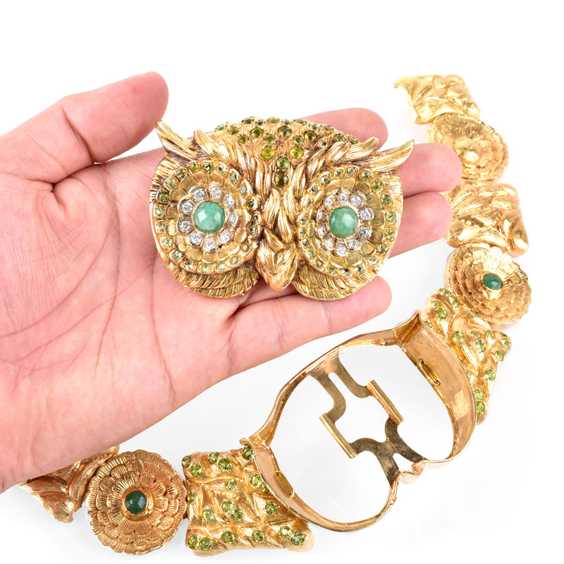 Circa 1970 Austrian Round Brilliant Cut Diamond, Cabochon Emerald, Peridot and Heavy 18 Karat Yellow Gold Large Collar Owl Necklace. 