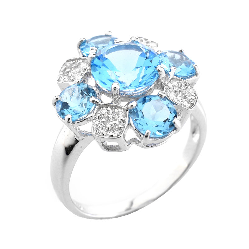 Approx. 4.86 Carat Round Cut London Topaz, Diamond and 18 Karat White Gold Ring. Topaz with vivid color. 