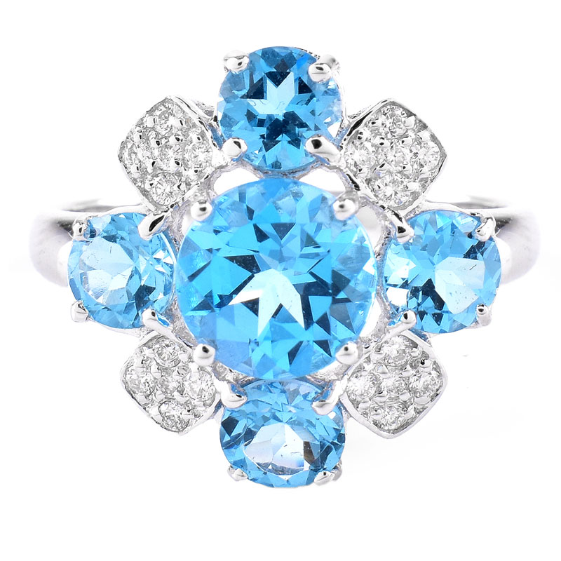 Approx. 4.86 Carat Round Cut London Topaz, Diamond and 18 Karat White Gold Ring. Topaz with vivid color. 