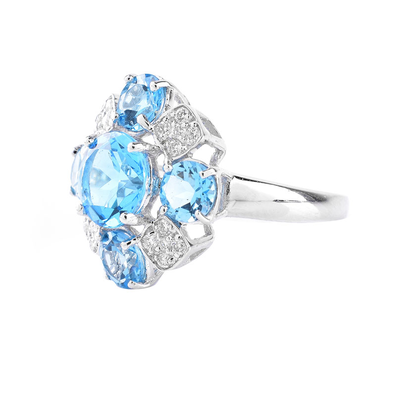 Approx. 4.86 Carat Round Cut London Topaz, Diamond and 18 Karat White Gold Ring. Topaz with vivid color. 