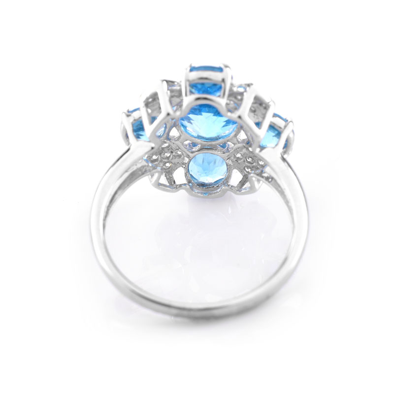 Approx. 4.86 Carat Round Cut London Topaz, Diamond and 18 Karat White Gold Ring. Topaz with vivid color. 