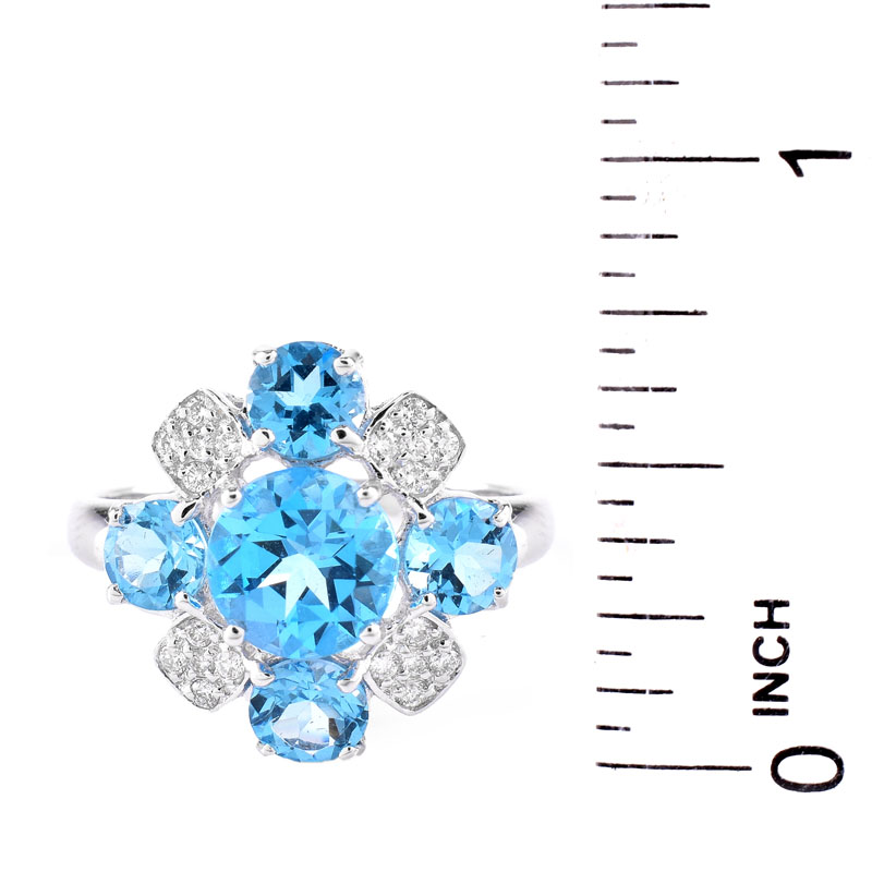 Approx. 4.86 Carat Round Cut London Topaz, Diamond and 18 Karat White Gold Ring. Topaz with vivid color. 