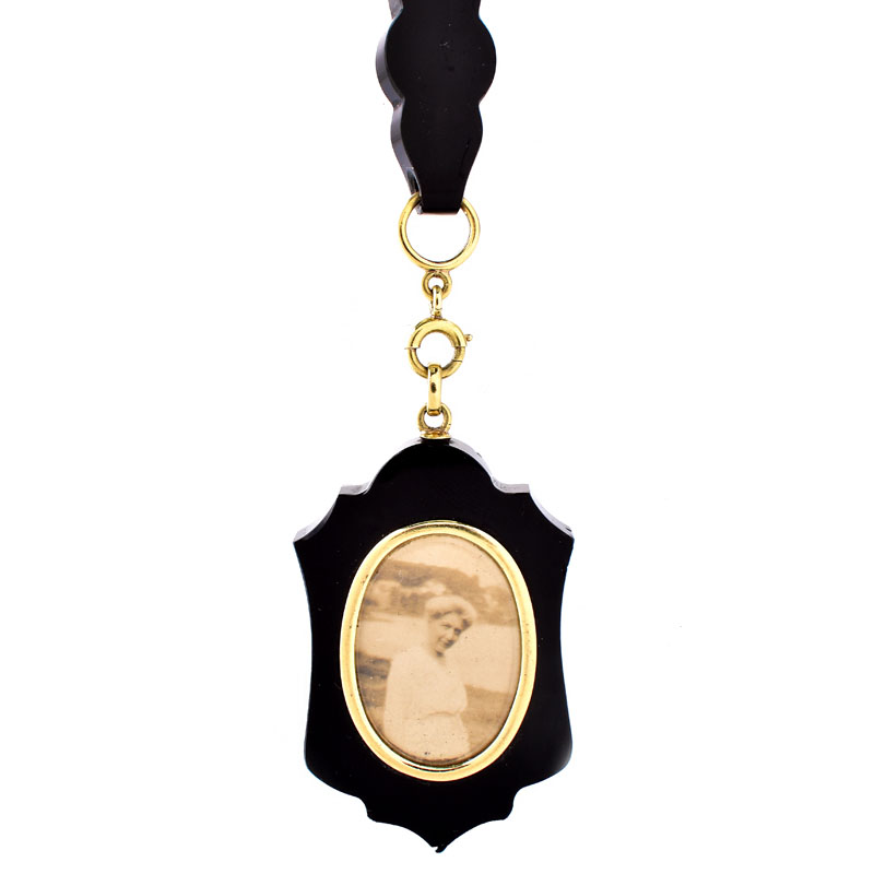 Victorian Carved Black Onyx, 14 Karat Yellow Gold and Seed Pearl Pendant Necklace. Stamped 14K to clasp.