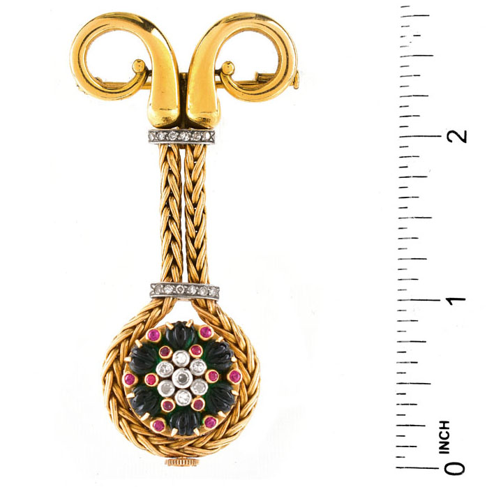 Circa 1940s 14 Karat Yellow Gold, Carved Emerald Bead, Ruby and Diamond Pendant Watch. Unsigned.