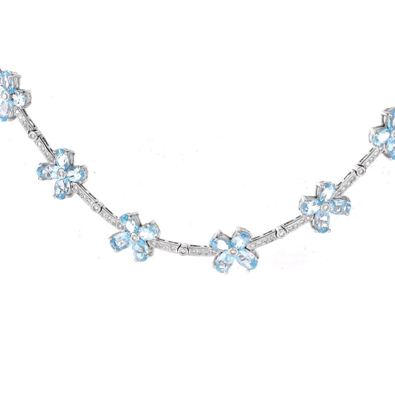 Contemporary Oval Cut Aquamarine, Round Brilliant Cut Diamond and 18 Karat White Gold Necklace.