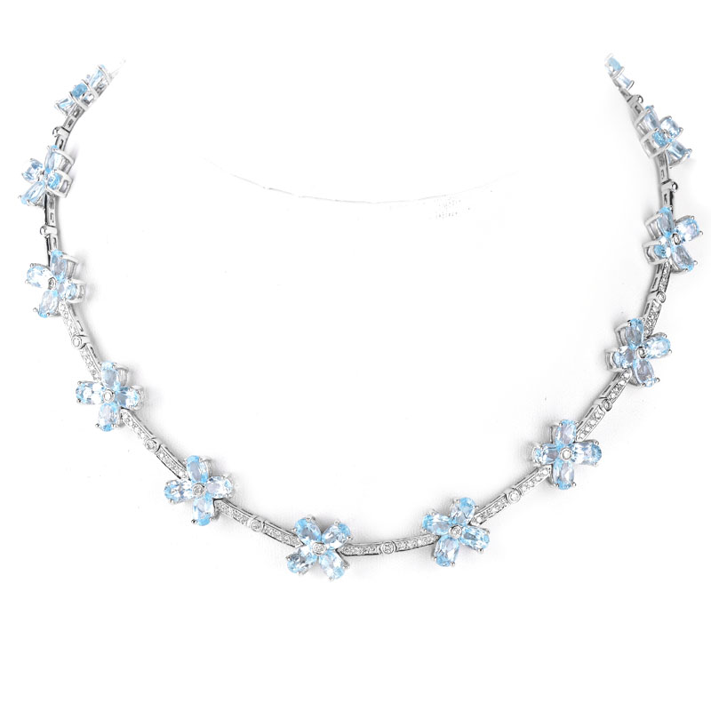 Contemporary Oval Cut Aquamarine, Round Brilliant Cut Diamond and 18 Karat White Gold Necklace.