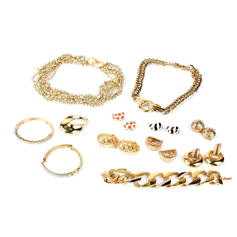 Collection of Vintage Gold Tone Signed Designer Costume Jewelry by Givenchy, Christian Dior and Kenneth Jay Lane.