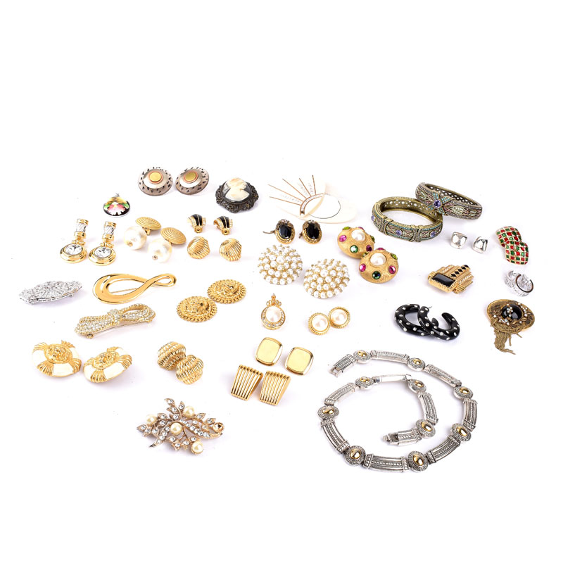 Collection of Vintage Costume Jewelry Accented with Faux Gemstones Including a Necklace, Bangle Bracelets, Brooches, Pendants, and Earrings.