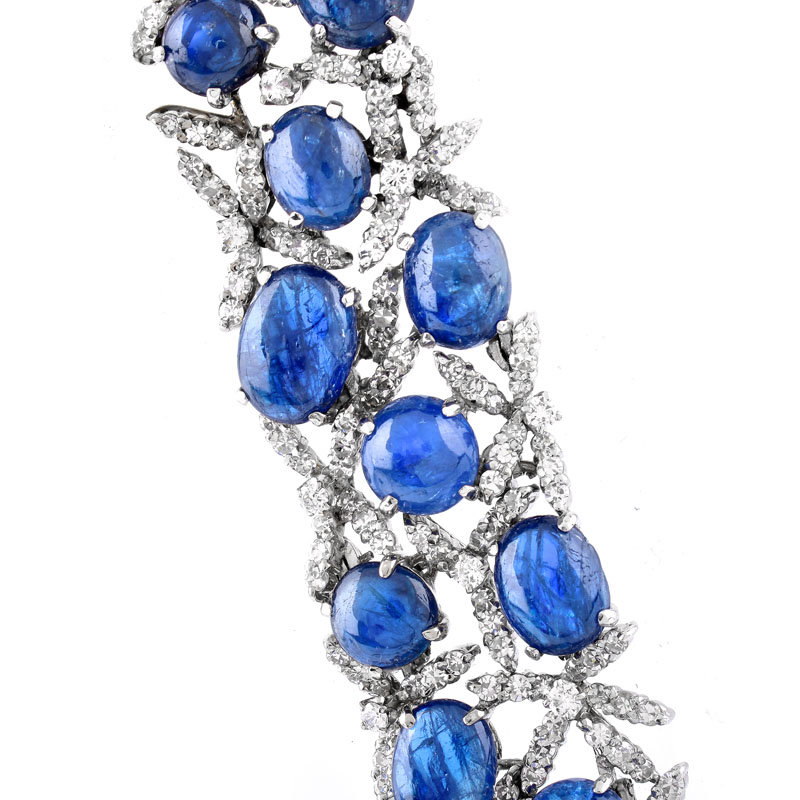 Approx. 50.0 Carat Oval Cabochon Sapphire, 8.0 Carat Round Brilliant Cut Diamond and 14 Karat White Gold Bracelet.