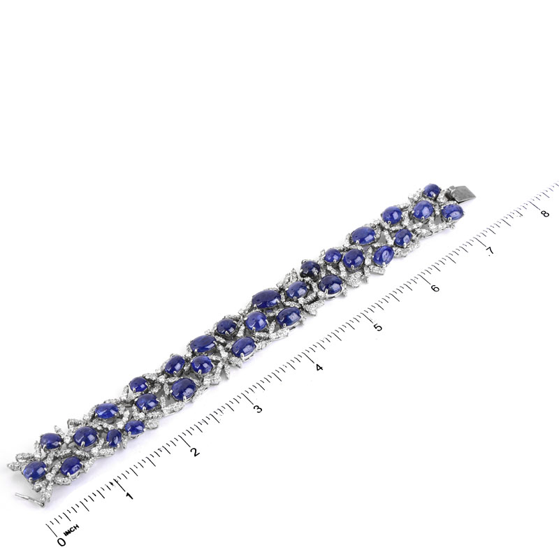 Approx. 50.0 Carat Oval Cabochon Sapphire, 8.0 Carat Round Brilliant Cut Diamond and 14 Karat White Gold Bracelet.