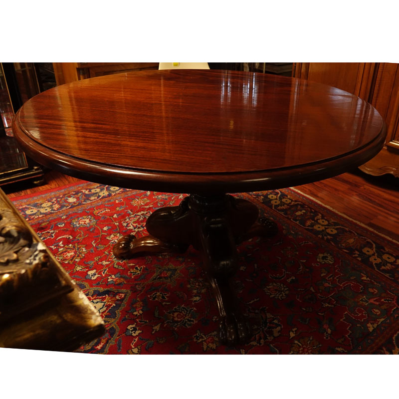 Antique Style Round Carved Mahogany Pedestal Table. Tripod baluster form base with paw feet.