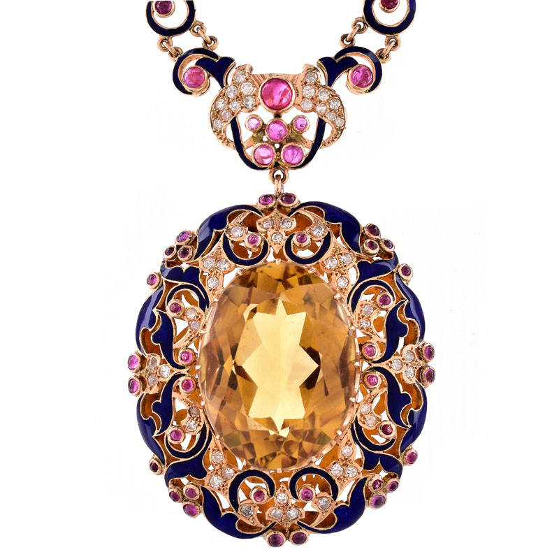 Circa 1950s Approx. 50.0 Carat Oval Cut Citrine, 5.0 Carat Cabochon Ruby, 2.0 Carat Round Brilliant Cut Diamond and Enameled 14 Karat Yellow Gold Pendant Necklace.