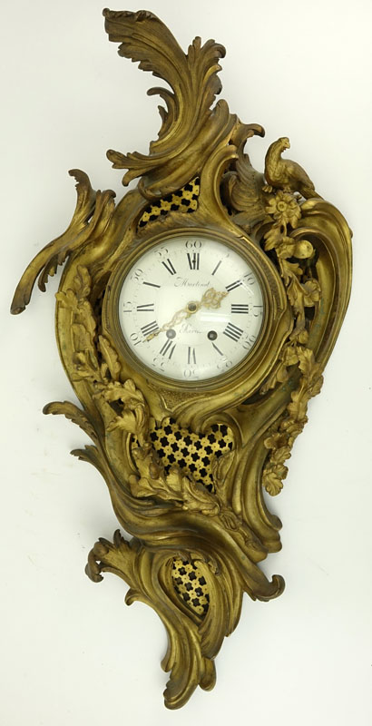 Antique French Gilt Bronze Cartel Clock. Not in running condition, rubbing to gilt. Measures 32" H x 17" W.