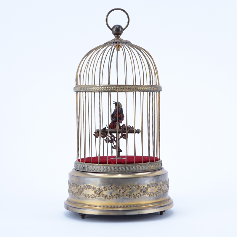 Antique French Gilt Brass Singing Bird in Cage. Stamped 'Made in France' and numbered 5427531 on underside.